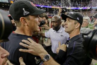 FILE - In this Feb. 3, 2013, file photo, San Francisco 49ers head coach Jim Harbaugh, left, greets Baltimore Ravens head coach John Harbaugh after the Ravens defeated the 49ers 34-31 in the NFL Super Bowl XLVII football game, in New Orleans. (AP Photo/Dave Martin, File)