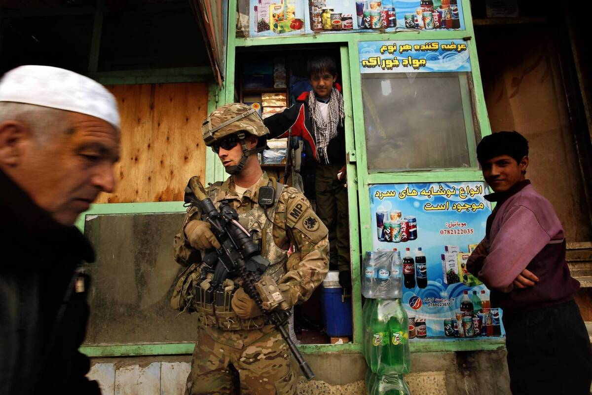 A U.S. soldier patrols downtown Kabul last month.
