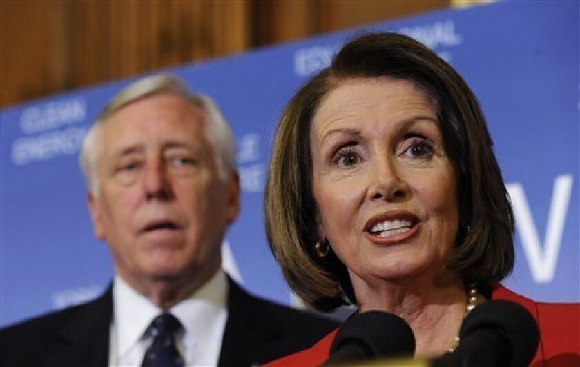 House Speaker Nancy Pelosi of Calif., accompanied by House Majority Leader Steny Hoyer of Md., speaks during a news conference on the House budget resolution for the fiscal 2010 federal budget, Thursday, April 2,2009, on Capitol Hill in Washington. (AP Photo/Susan Walsh)