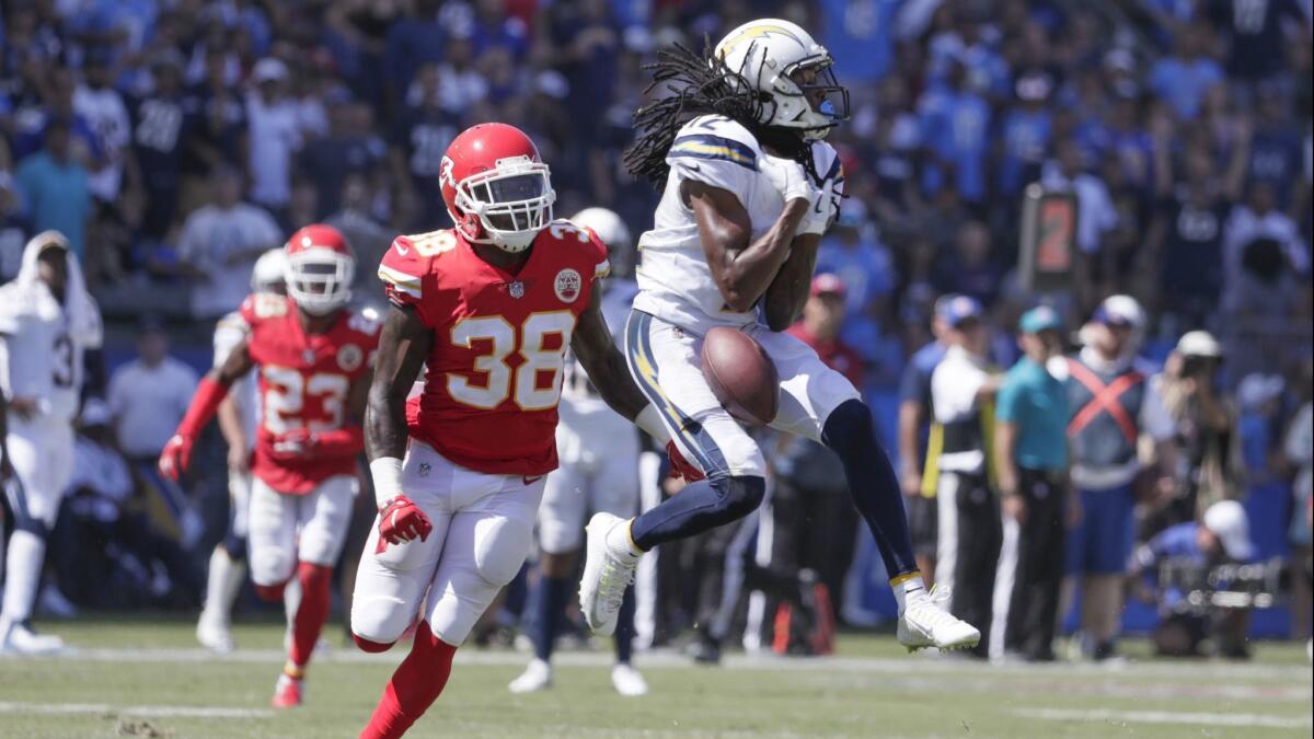 After beating Chiefs safety Ron Parker downfield, Chargers receiver Travis Benjamin drops a long pass from quarterback Philip Rivers in the fourth quarter Sunday.