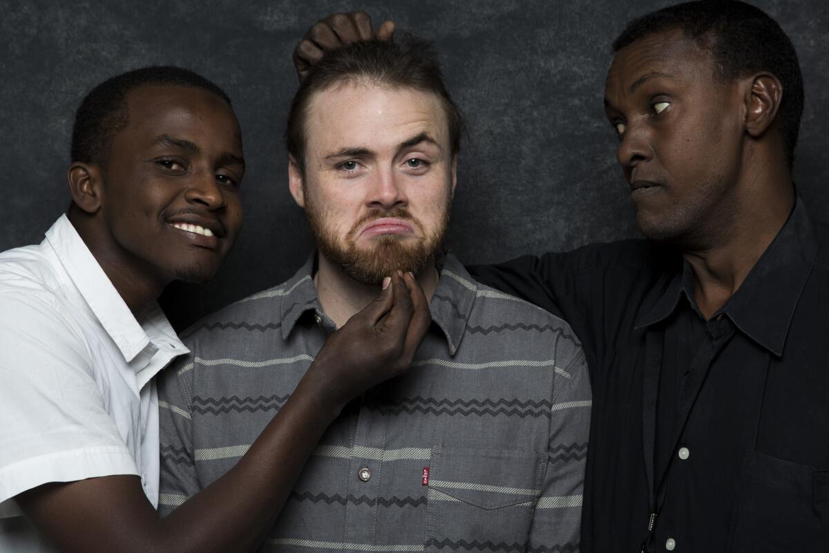 Cutter Hodierne, center, with Abdikani Muktar, left, and Abubakr Mire of the “Fishing” cast, at Sundance festival in January.