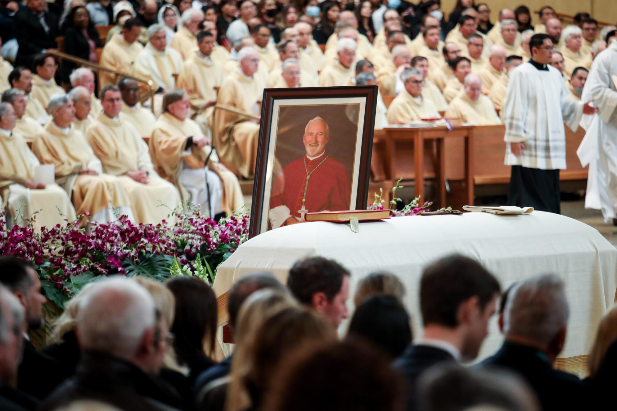 The coffin and a photo of the bishop