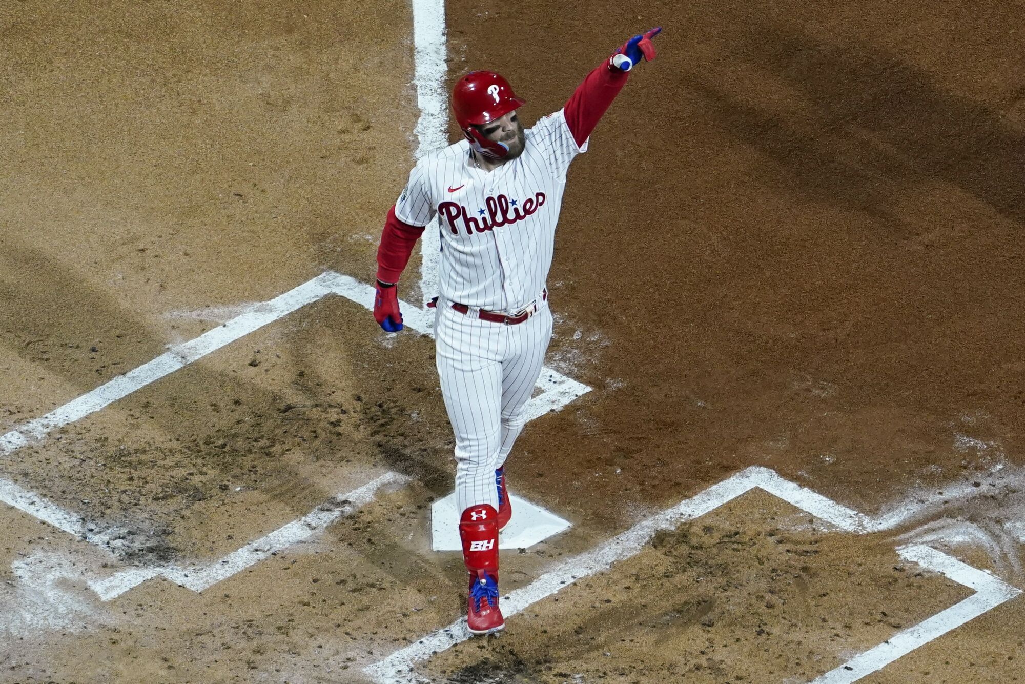 Philadelphia's Bryce Harper celebrates after hitting a two-run home run in Game 3 of the World Series on Tuesday.