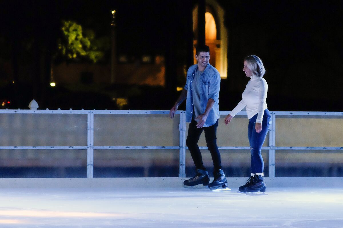 Logan and Katlyn enjoy a romantic evening at the Rady Children’s Ice Rink at Liberty Station.