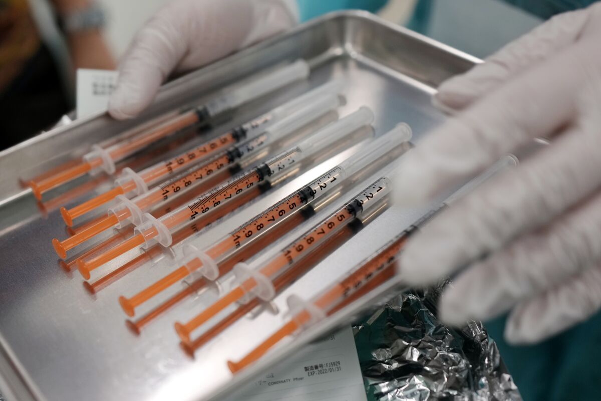 Syringes with the Pfizer vaccine