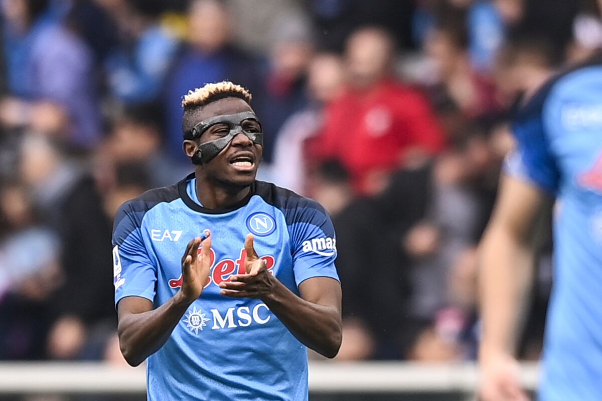 Napoli's Victor Osimhen celebrates after scoring during the Serie A soccer match between Torino and Napoli at the Turin Olympic stadium, Italy, Sunday, March 19, 2023. (Fabio Ferrari/LaPresse via AP)