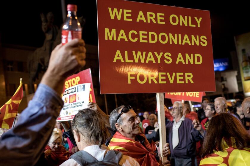 SKOPJE, MACEDONIA - SEPTEMBER 30: Supporters of the movement to boycott the referendum vote celebrate in the street after election officials announced low voter turn out figures on September 30, 2018 in Skopje, Macedonia. Macedonians across the country went to the polls today to vote in a referendum to change the country's name to the 'Republic of North Macedonia', however preliminary figures indicate less than 50% voter turn out, a blow to Prime Minister Zoran Zaev's hopes of accepting a deal with Greece. (Photo by Chris McGrath/Getty Images) ** OUTS - ELSENT, FPG, CM - OUTS * NM, PH, VA if sourced by CT, LA or MoD **