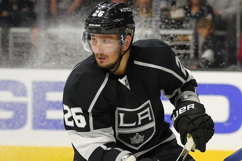 FILE - In this Oct. 16, 2014, file photo, Los Angeles Kings defenseman Slava Voynov, of Russia, skates during the third period of an NHL hockey game against the St. Louis Blues in Los Angeles. An arbitrator has upheld Voynovs one-season suspension by the NHL but is giving him credit for serving half of it in 2018-19. Commissioner Gary Bettman suspended the former Los Angeles Kings defenseman for the 2019-20 season and 2020 playoffs after it determined he committed acts of domestic violence. The NHL Players Association appealed the ruling. (AP Photo/Mark J. Terrill, File)