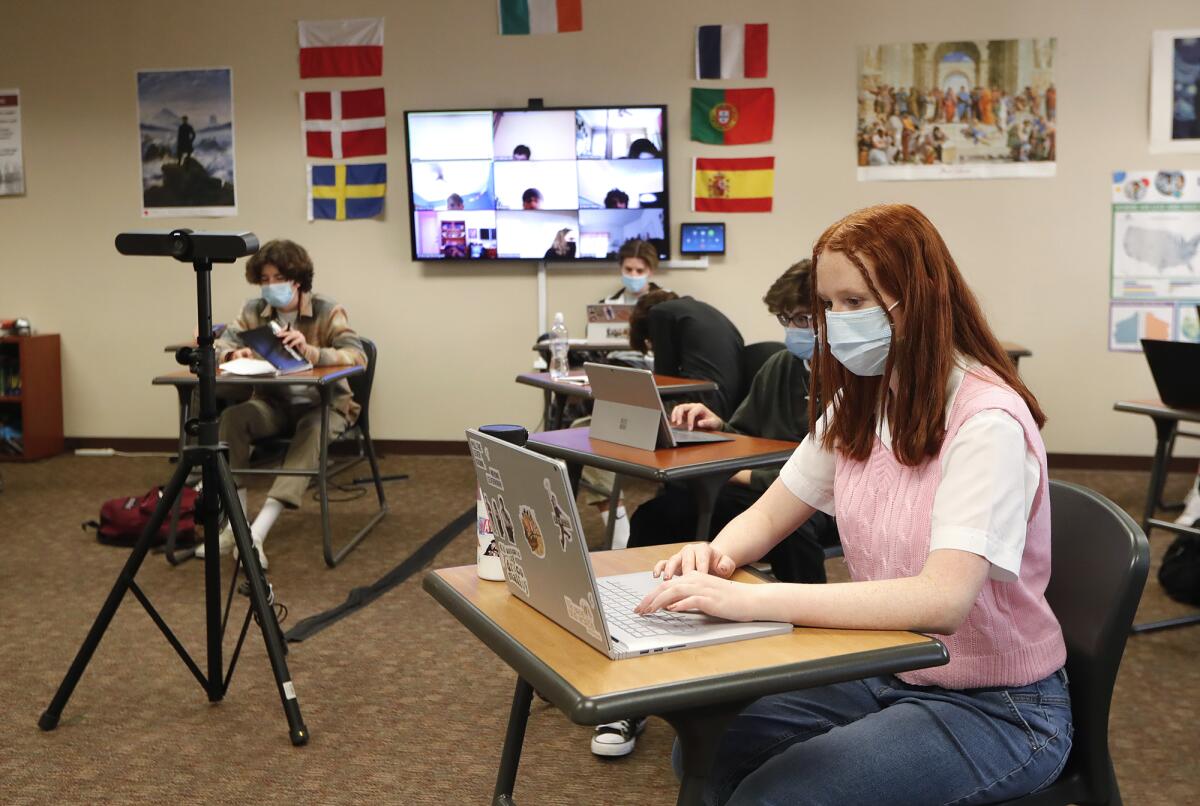 A student works on a classroom project in Laura Kennedy's social studies class.