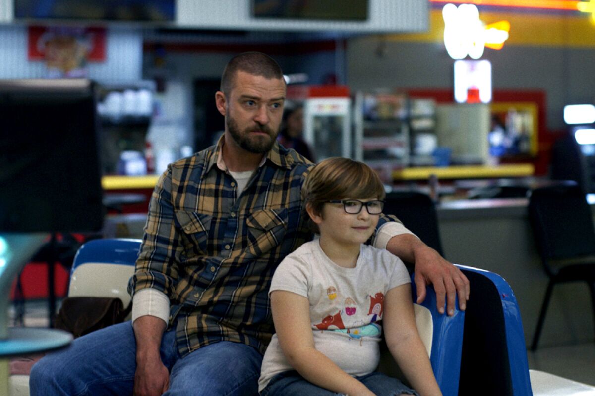 Justin Timberlake and Ryder Allen in the movie "Palmer."