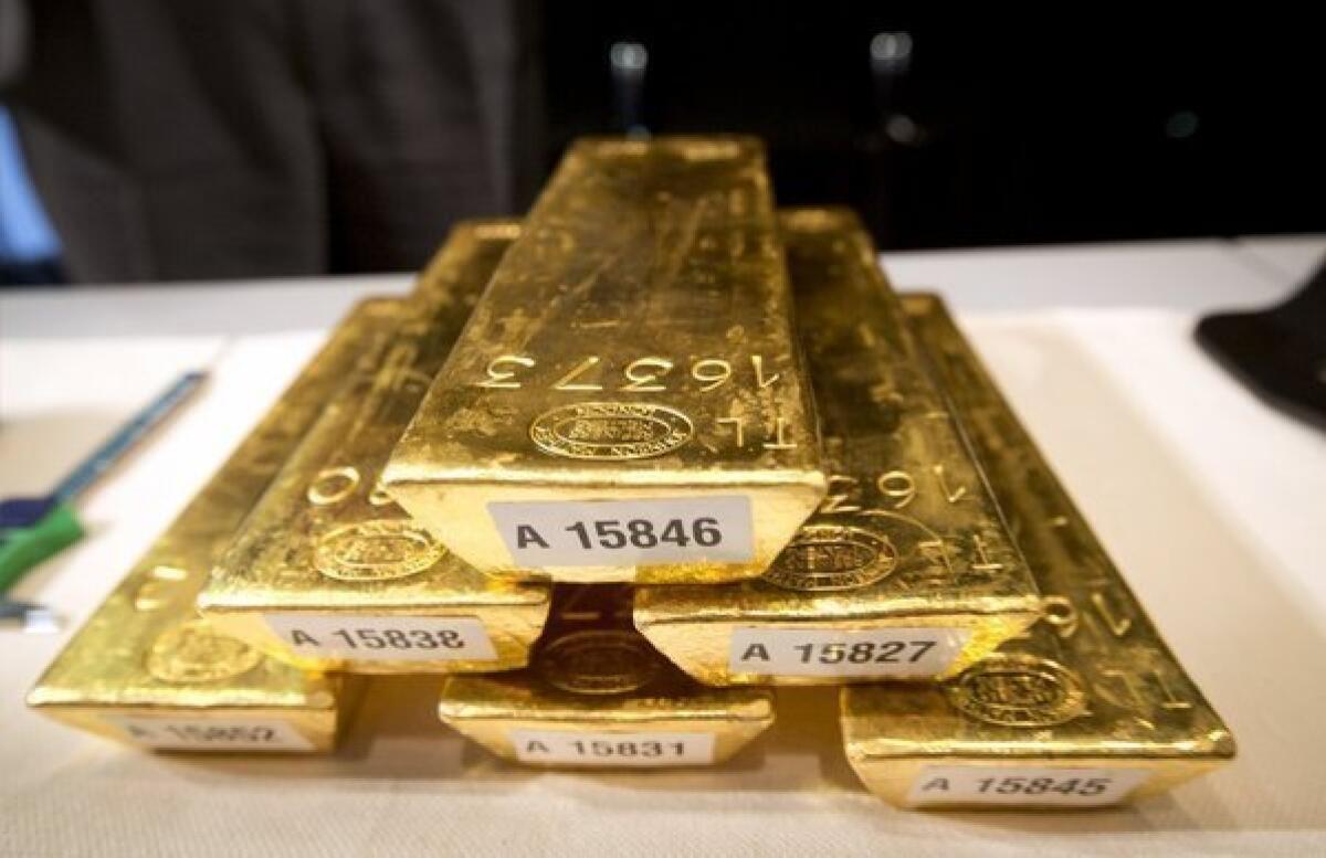 The price of an ounce of gold was down 7% to as low as $1,398 an ounce Monday, after falling 5% on Friday.