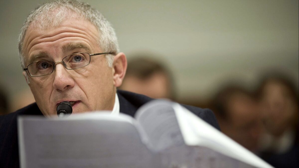 Ticketmaster Entertainment Chief Executive Officer Irving Azoff reads his opening statement on Capitol Hill as he testified before the House Courts and Competition Policy subcommittee on Feb. 26, 2009.