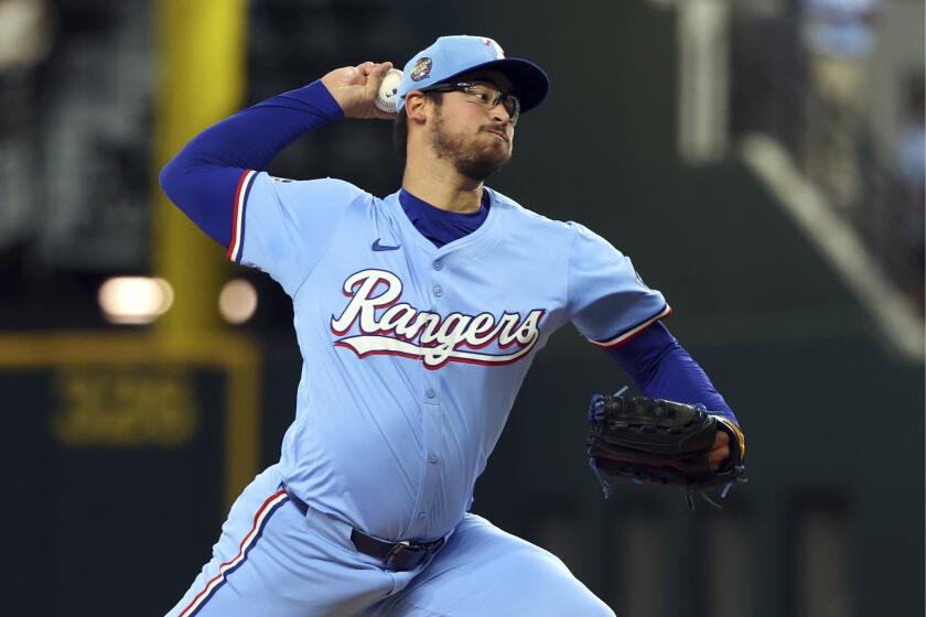 Texas Rangers starting pitcher Dane Dunning delivers against the Cincinnati Reds in the first inning of a baseball game Sunday, April 28, 2024, in Arlington, Texas. (AP Photo/Richard W. Rodriguez)