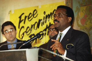 Attorney Johnnie Cochran speaking at a news conference