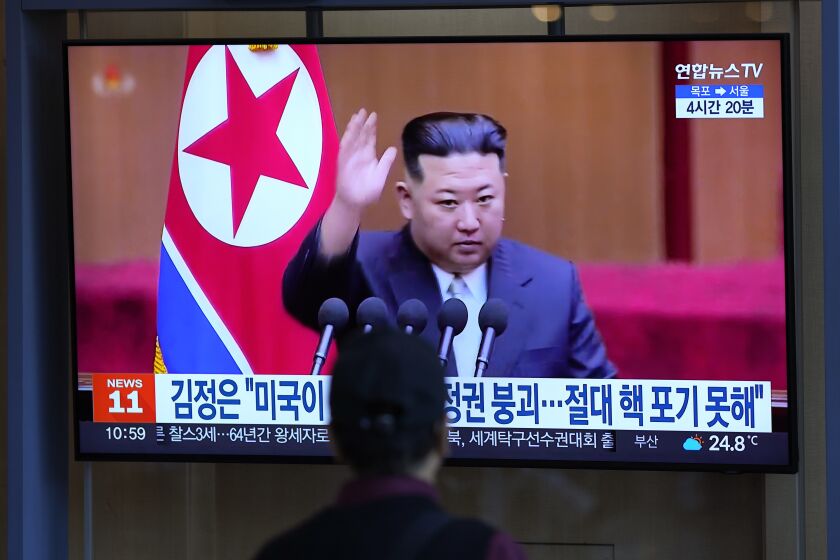 A man watches a TV screen showing a news program reporting with a file footage of North Korean leader Kim Jong Un, at the Seoul Railway Station in Seoul, South Korea, Friday, Sept. 9, 2022. North Korean leader Kim stressed his country will never abandon the nuclear weapons it needs to counter the United States, which he accused of pushing to weaken the North's defenses and eventually collapse his government, state media said Friday. (AP Photo/Lee Jin-man)