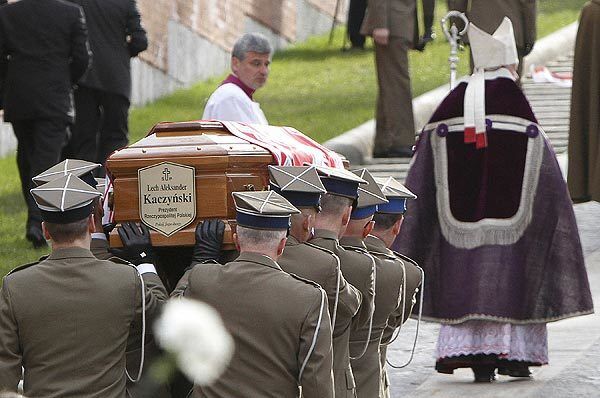 Polish soldiers carry the coffin of President Lech Kaczynski in Krakow. Kaczynski and his wife, Maria, were interred at the historic Wawel cathedral after a majestic funeral Mass at St. Mary's cathedral. http://www.latimes.com/news/nationworld/world/europe/la-fg-poland-funeral19-2010apr19,0,4367954.story