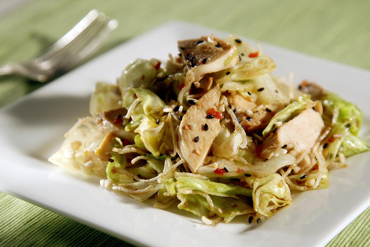 The adapted recipe for Chi Dynasty's Chinese chicken salad includes steps for making the fresh dressing. Recipe