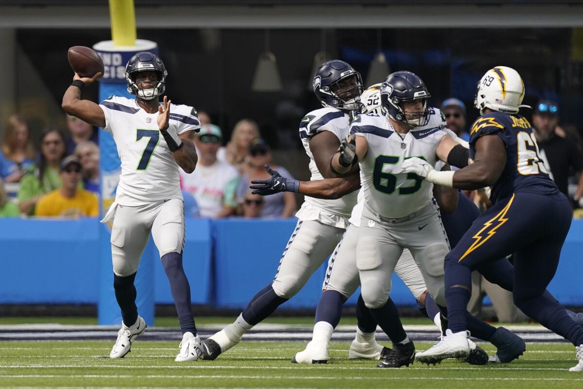 Seattle Seahawks quarterback Geno Smith throws during the first quarter Sunday.