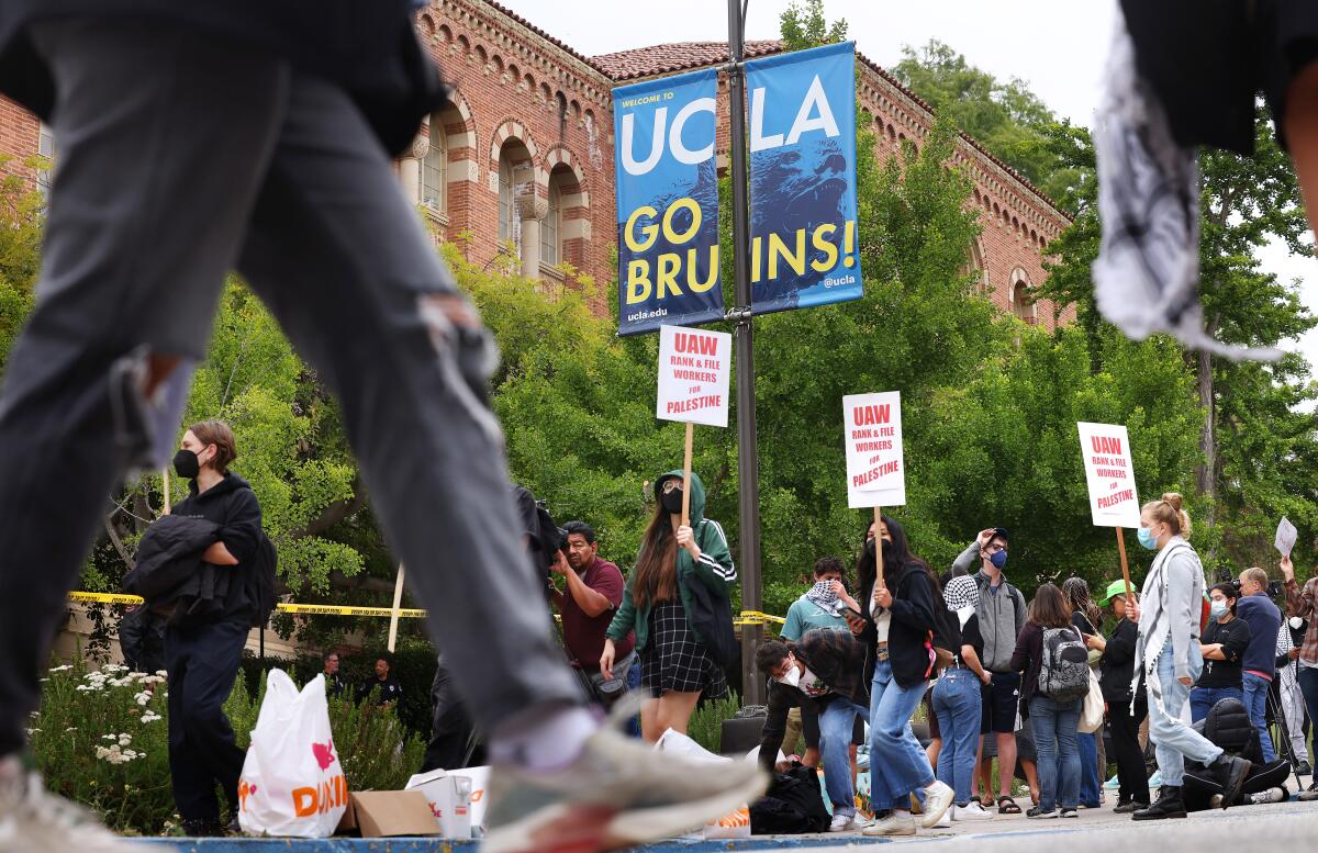 A group of students with picket signs