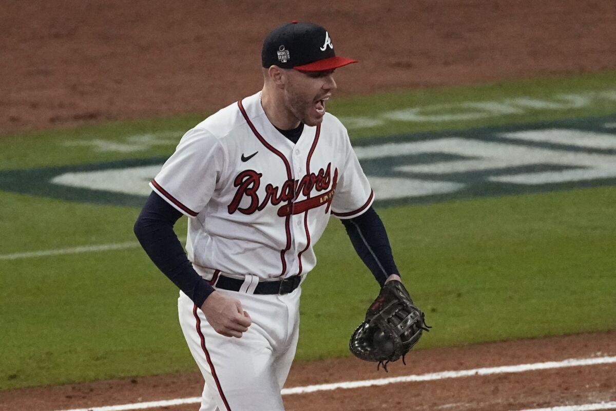 Atlanta Braves first baseman Freddie Freeman celebrates during Game 4 of the World Series.