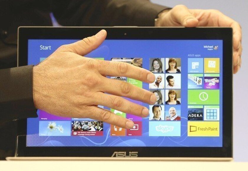 The Microsoft Windows 8 operating system is unveiled at a news conference in New York City. Windows 8 includes a new interface called the Start Screen, which was designed for tablets and touchscreen computers and features moving tiles similar to those on Windows Phone devices.