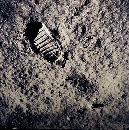 A footprint is left on the lunar surface after Neil Armstrong and Buzz Aldrin became the first men to walk on the moon. The mission fulfilled President Kennedy's 1961 mandate to land a man on the moon by the end of the 1960s.