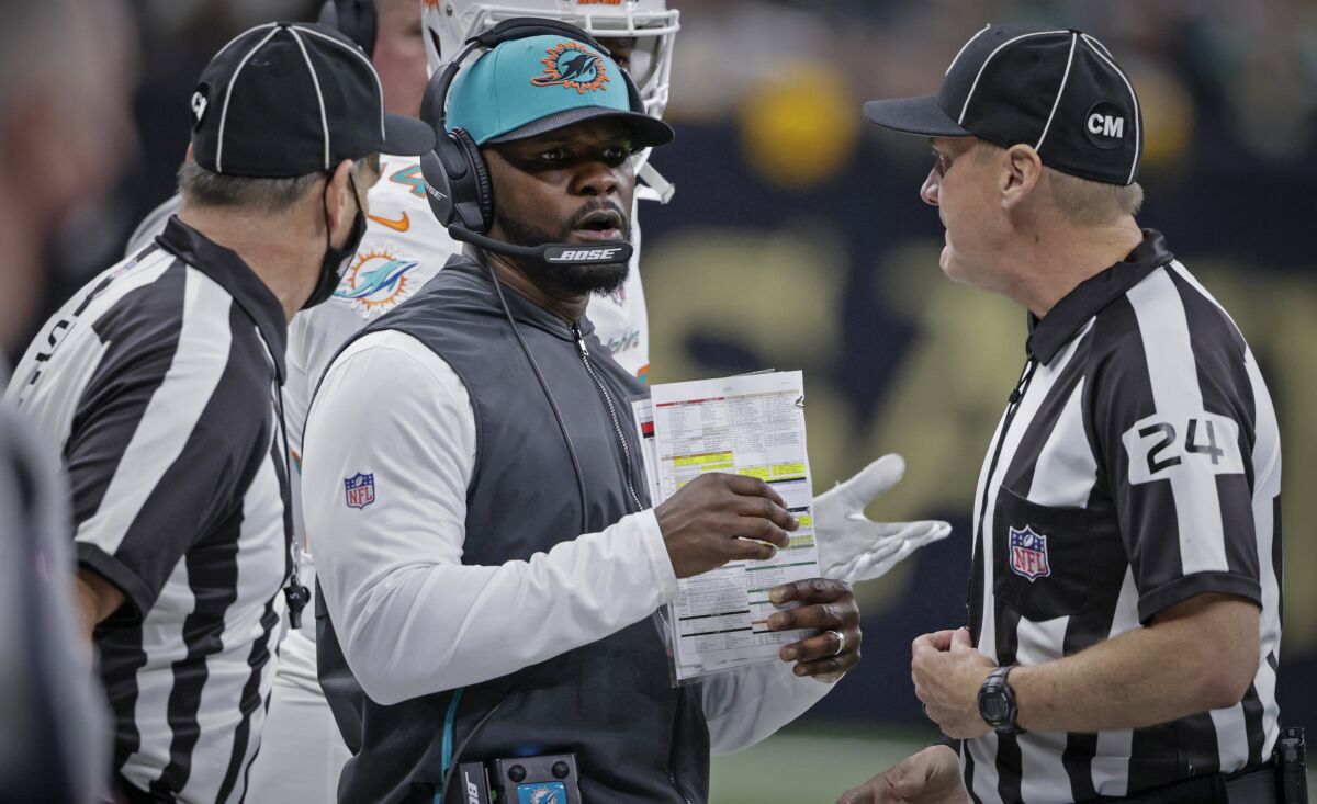 Former Miami Dolphins head coach Brian Flores is shown on the sidelines Dec. 27 during a game at New Orleans.
