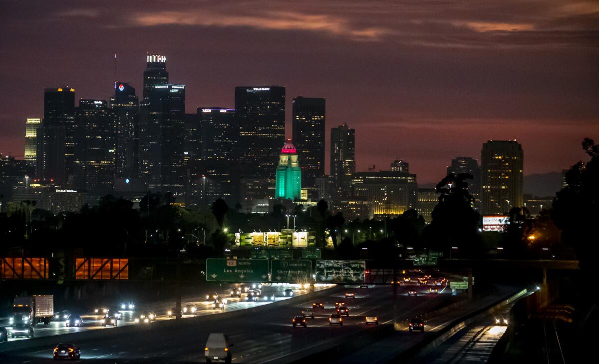 Los Angeles City Hall at night.