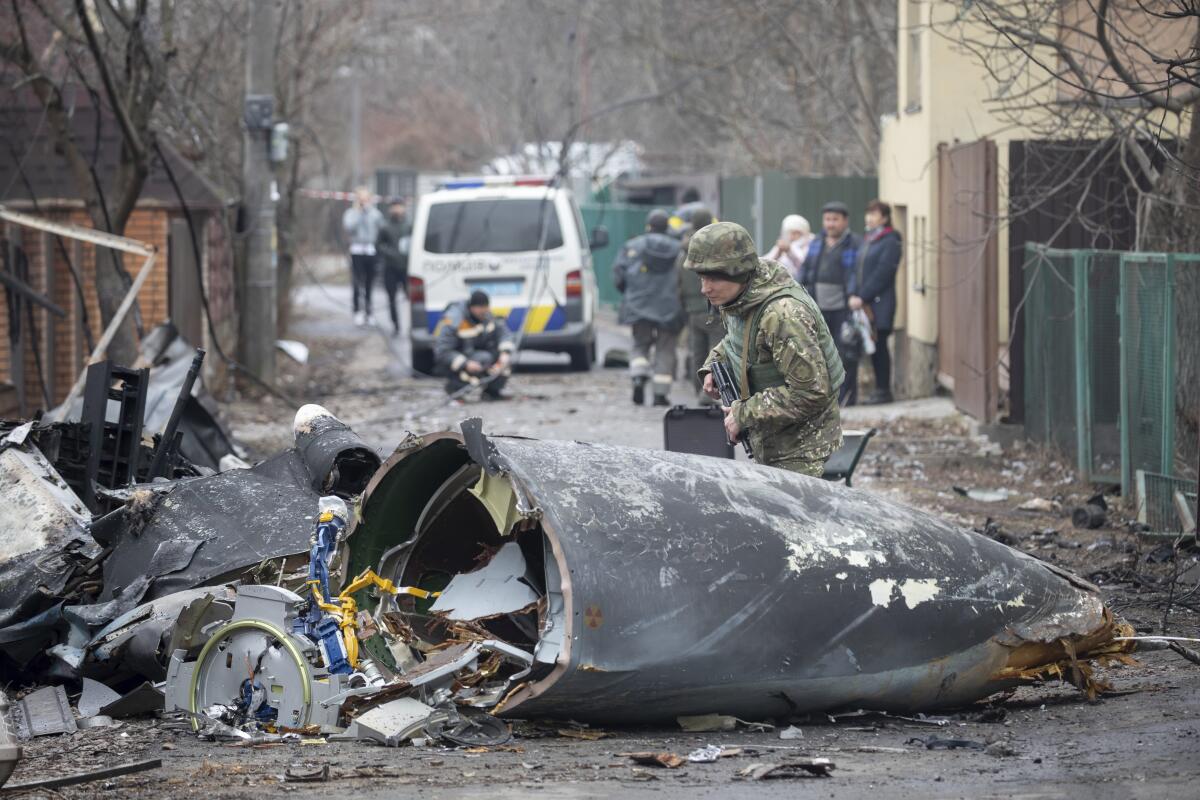 A piece of an aircraft sits in a street in Kyiv, Ukraine.