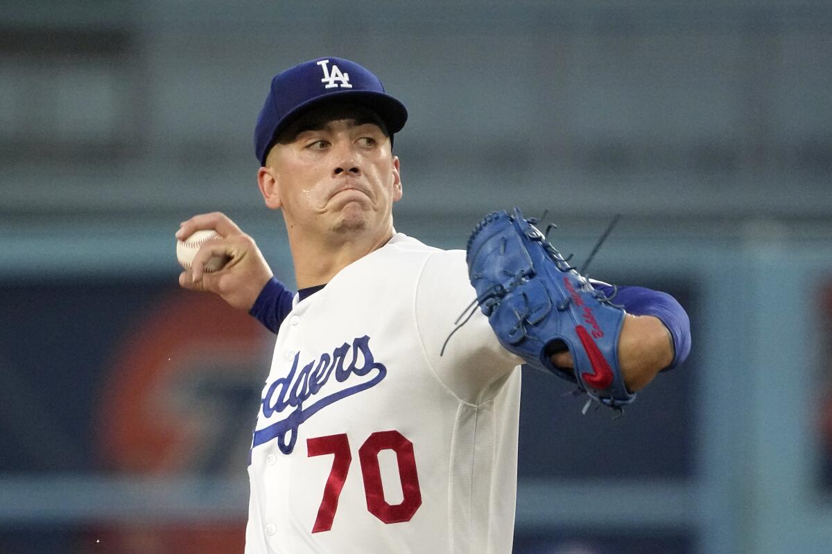 Dodgers starting pitcher Bobby Miller delivers during the first inning against the Arizona Diamondbacks.