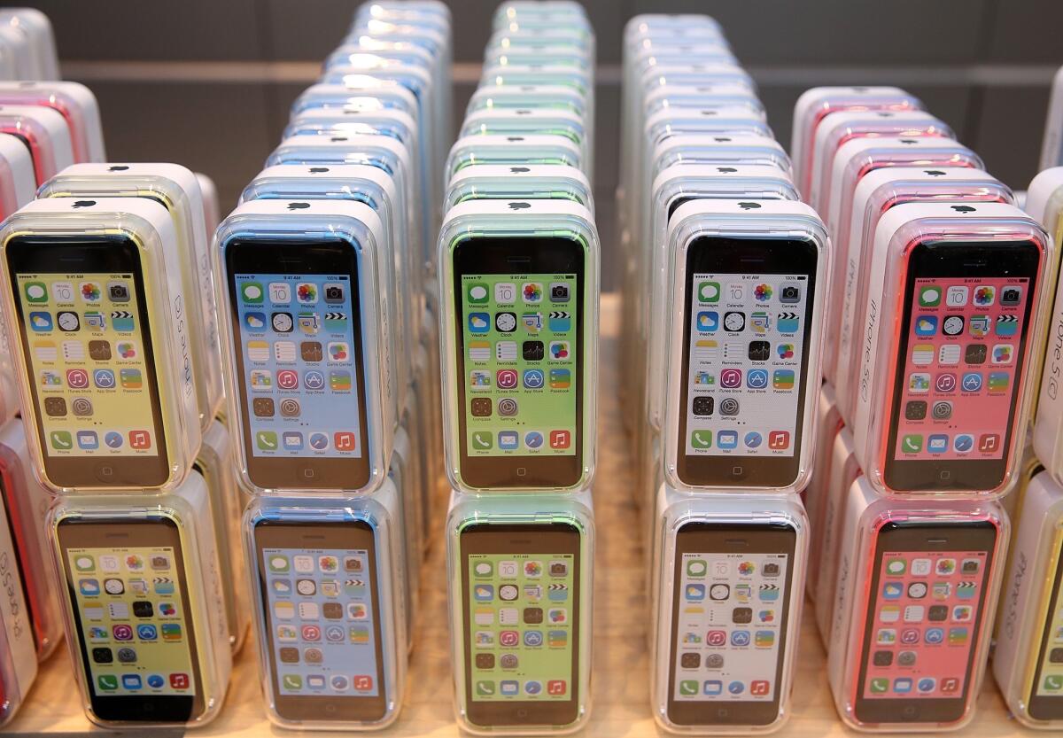 An Apple iPhone 5C display at an Apple Store in Palo Alto, Calif.