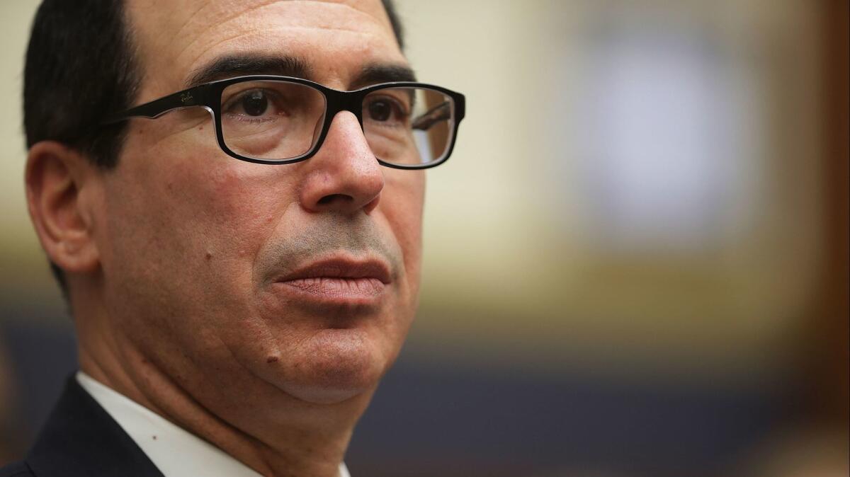U.S. Treasury Secretary Steven T. Mnuchin testifies before the House Financial Services Committee on July 12 in Washington. Mnuchin answered questions about the state of the international financial system.