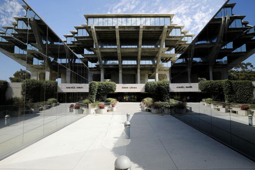 SAN DIEGO, CA - AUGUST 12: The normally busy Geisel Library at UC San Diego is quiet on Wednesday, Aug. 12, 2020 in San Diego, CA. San Diego area colleges have turned into ghost towns since the coronavirus pandemic, (K.C. Alfred / The San Diego Union-Tribune)