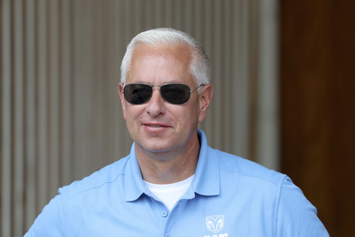 FILE - In this May 1, 2019, file photo, trainer Todd Pletcher smiles at Churchill Downs in Louisville, Ky. Pletcher earned his 5,000th career victory at Aqueduct on Friday, Nov. 6, 2020, in New York. Microsecond scored a three-quarter length victory in the seventh race. (AP Photo/Gregory Payan, File)