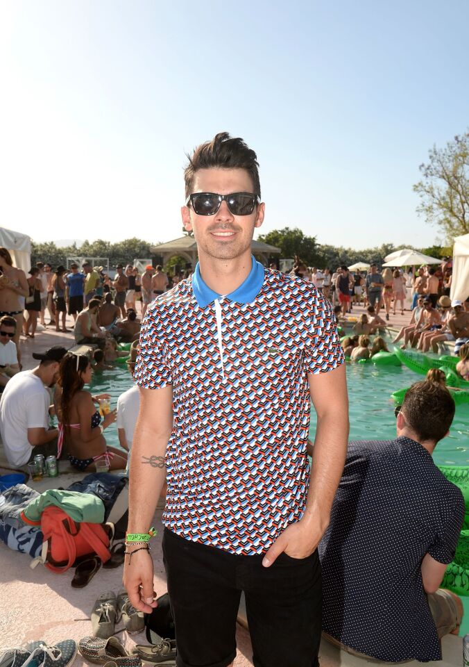 Joe Jonas poses at the party.