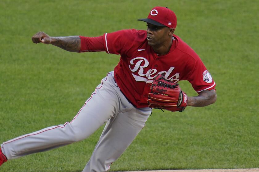 Cincinnati Reds relief pitcher Raisel Iglesias delivers during the ninth inning.