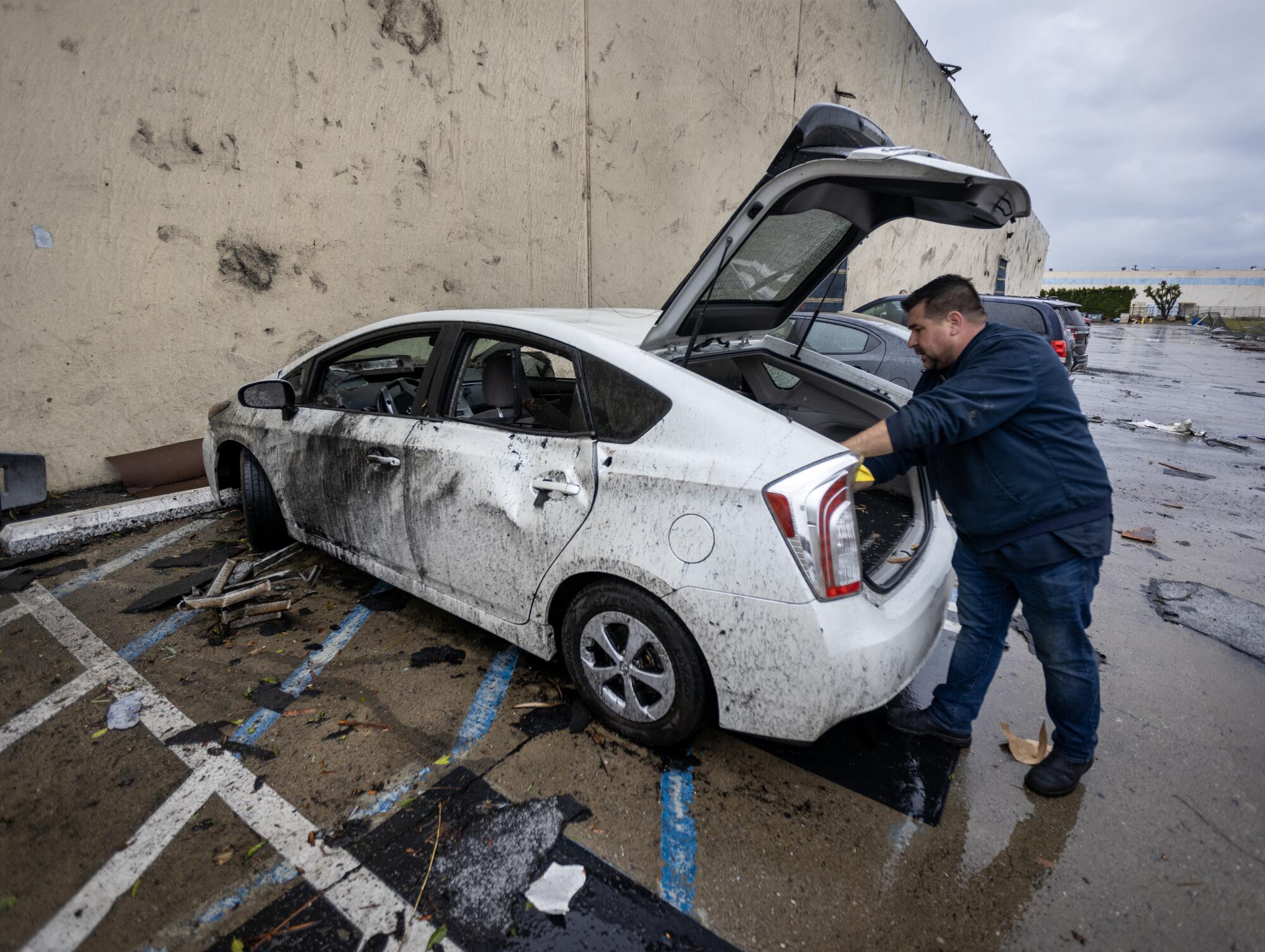 An employee who was inside the the Royal Paper Box Company when the roof was torn off during a tornado