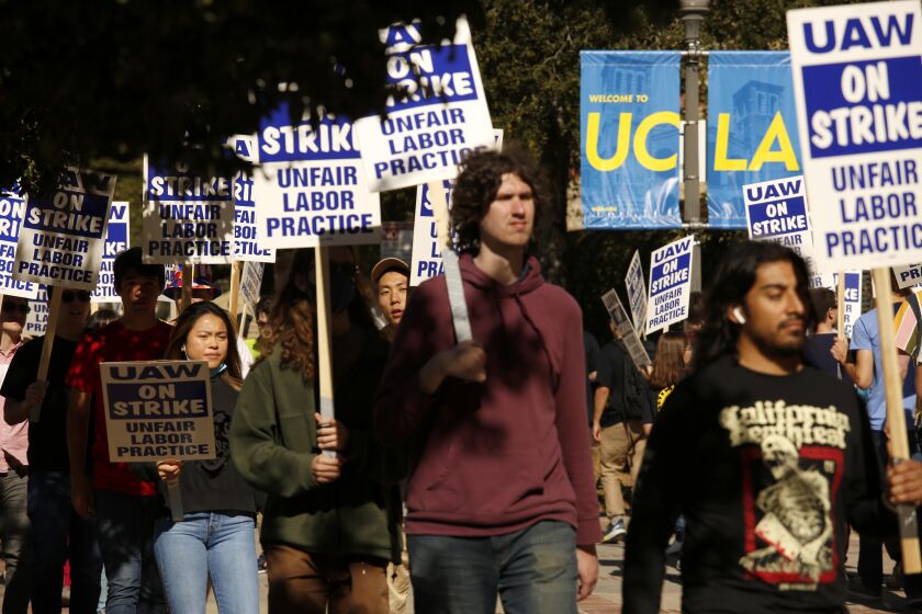 LOS ANGELES, CA - NOVEMBER 16, 2022 - - UCLA academic workers join tens of thousands of their peers across the University of California system in striking for more equitable wages and better working conditions on the UCLA campus on November 16, 2022. 48,000 University of California academic workers - including postdoctoral scholars, graduate teaching assistants and researchers - walked off the job this week in a strike billed as the largest at any academic institution in history. Genaro Molina / Los Angeles Times)