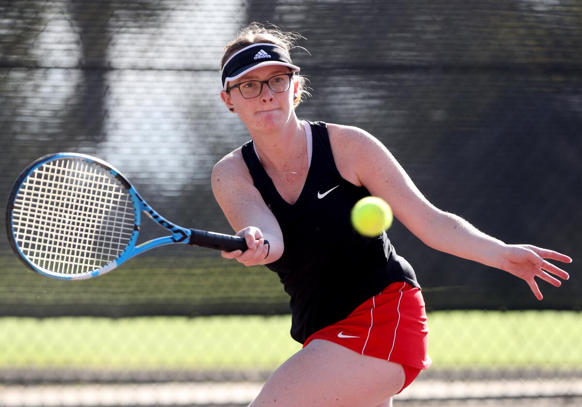 Flintridge Sacred Heart Academy tennis single player Meghan Sullivan returns the ball in home game vs. Century or Torrance in CIF Southern Section Division IV first-round playoff match at Scholl Canyon Golf & Tennis Club in Glendale on Wednesday, Nov. 6, 2019.