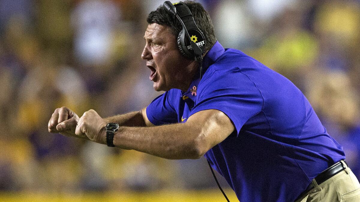 Coach Ed Orgeron yells instructions to LSU players during their 42-7 victory over Missouri on Oct. 1.
