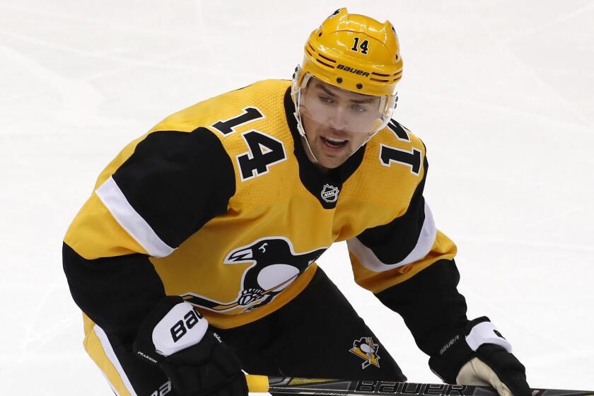 Pittsburgh Penguins' Tanner Pearson skates during the first period of the team's NHL hockey game against the Tampa Bay Lightning in Pittsburgh, Thursday, Nov. 15, 2018. It was Pearson's first game with the Penguins since being acquired from the Los Angeles Kings. The Lightning won 4-3. (AP Photo/Gene J. Puskar)