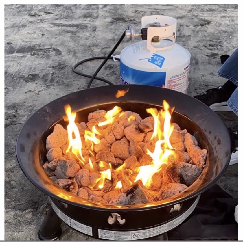 Meinrat Andreae, an atmospheric chemist, suggests switching to propane fires like this on local beaches.