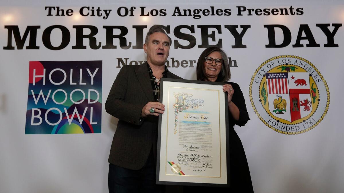 Morrissey with L.A. City Councilwoman Monica Rodriguez in a pre-show ceremony designating Nov. 10 as Morrissey Day in L.A.