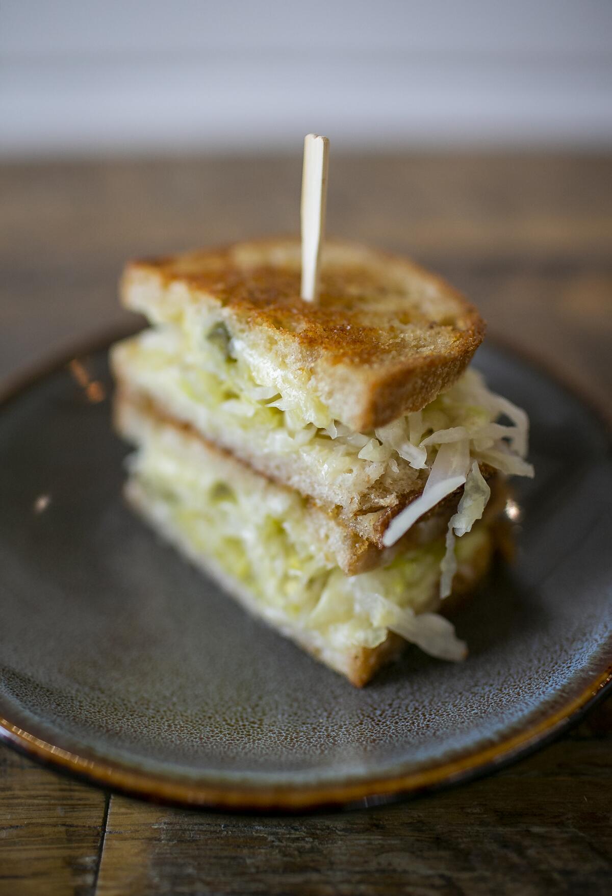 The Kraut grilled cheese with raw cheese and sourdough from the Fermentation Farm.
