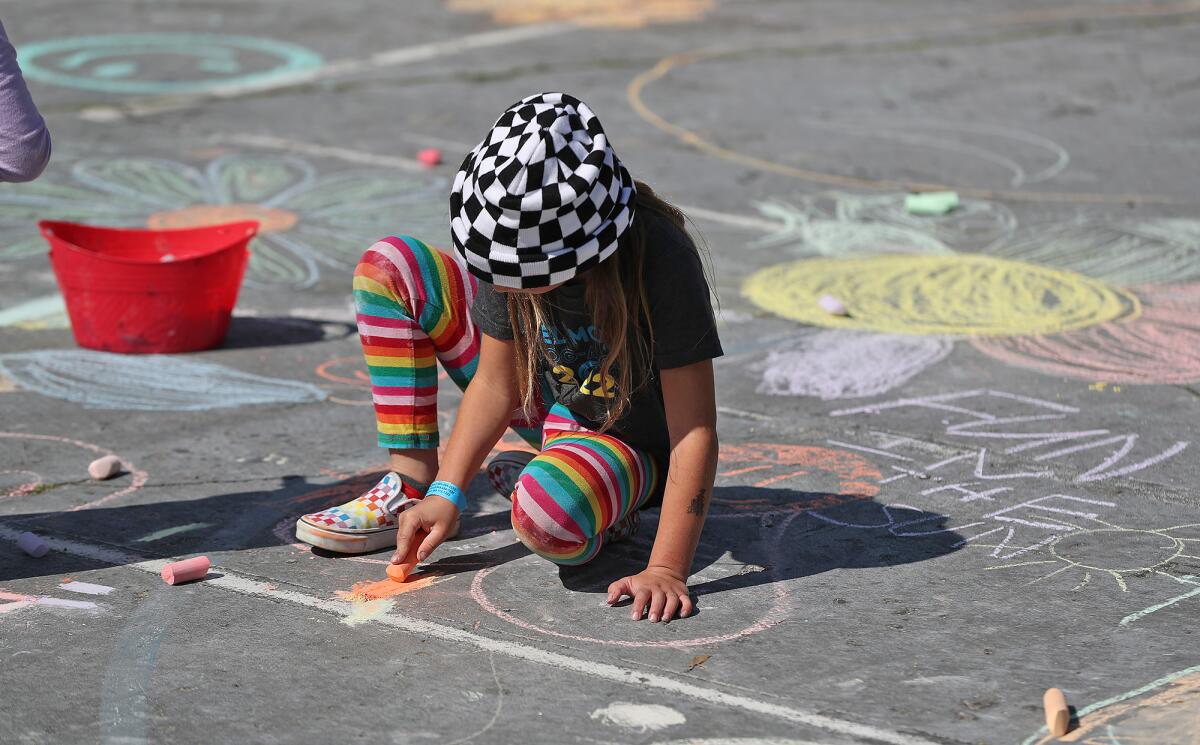 A youngster draws during the "Look Up" experience at the Boys & Girls Club of Laguna Beach.