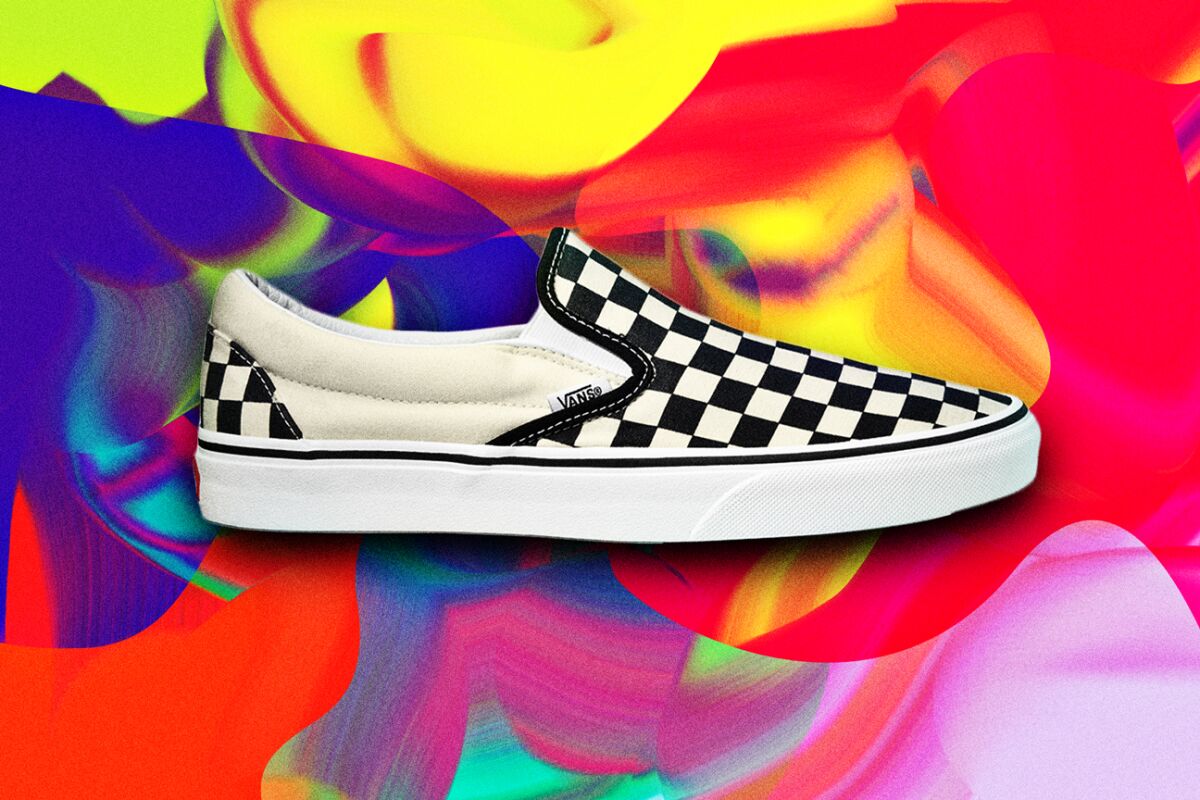 A Vans black-and-white checkerboard slip-on sneaker.