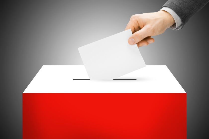 Voting concept - Ballot box painted into national flag colors - Poland