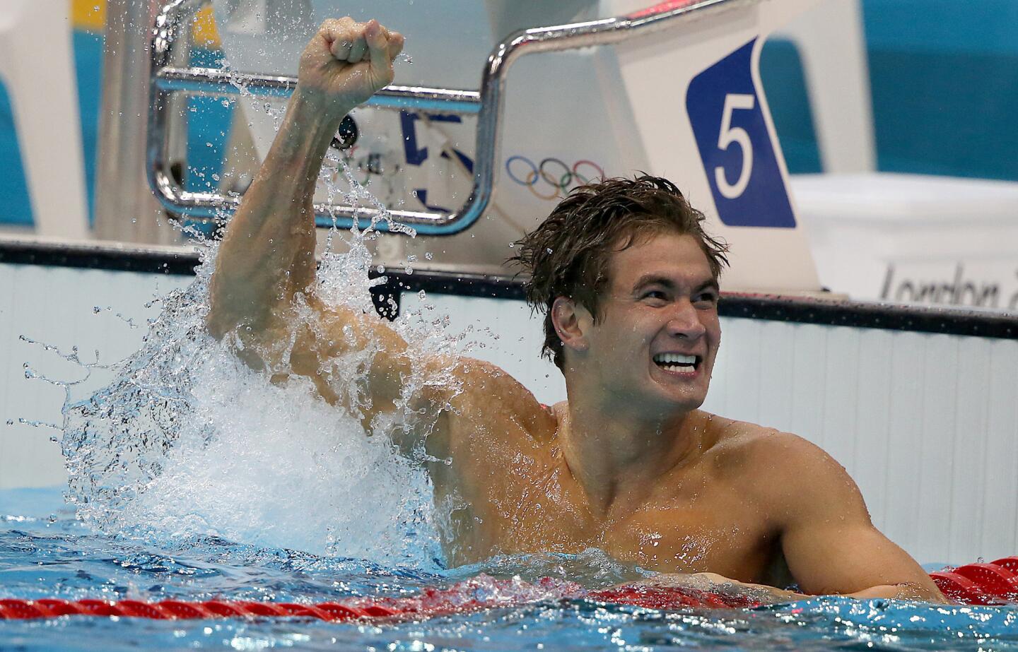 U.S. swimmer Nathan Adrian celebrates his gold medal victory in the men's 100m freestyle at the London Olympics.