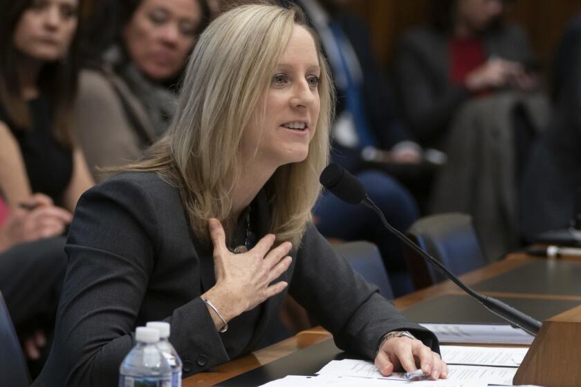 Kathy Kraninger, director of the Consumer Financial Protection Bureau, takes questions from the House Financial Services Committee's biannual review of the CFPB, on Capitol Hill in Washington, Thursday, March 7, 2019. (AP Photo/J. Scott Applewhite)