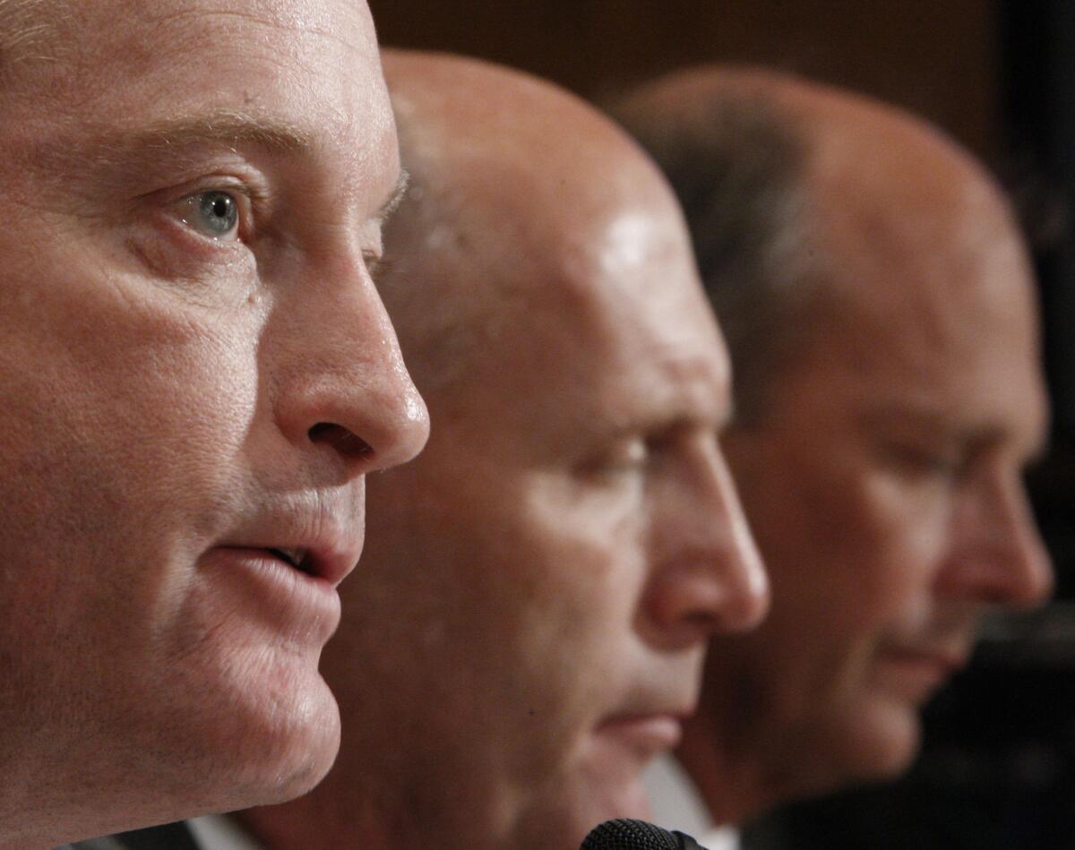 From left to right, Lamar McKay, president and chairman of BP America; Transocean Chief Executive Steven Newman; and Halliburton executive Tim Probert testify on Capitol Hill in 2010.